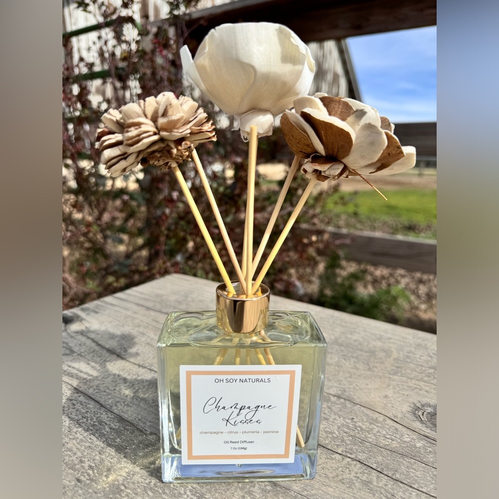 Homemade Oil Reed Diffuser with flower reed sticks.